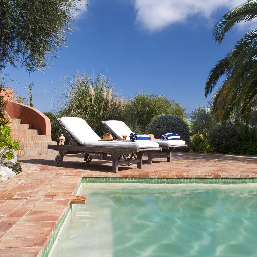 sunbeds by villa pool